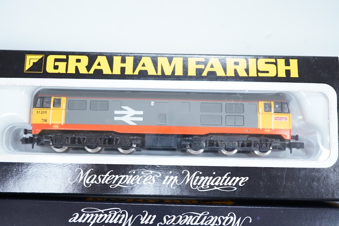 Four boxed Graham Farish N gauge railway Class 31 Co-Co diesel locomotives; a BR, 31 552 (806A), an EWS, 31 466 (806B), a BR, 31 205 (8066) and a Regional Railways, 31 421 (8067).
